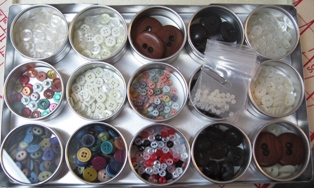 Doll Buttons kept in jewellers cases