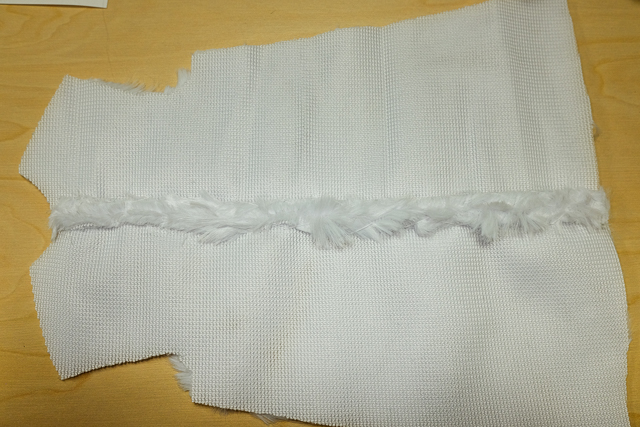 Sew the back seam of the jacket