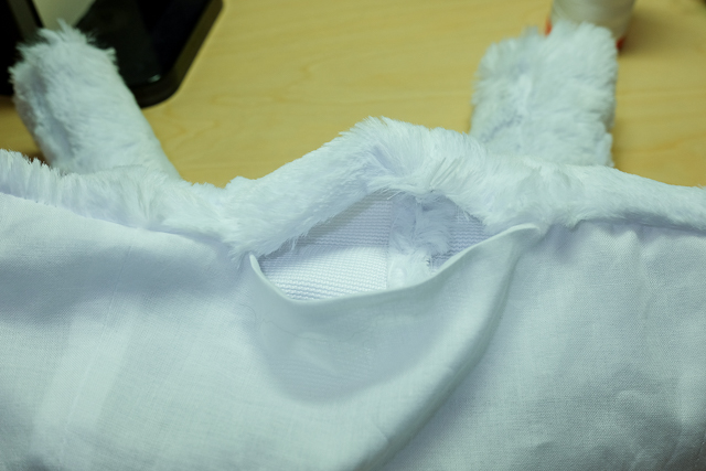 The opening left for turning on the back bottom of the jacket.